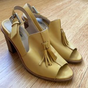 Yellow leather high heels